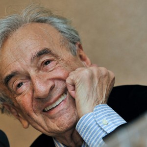 Elie Wiesel smiles during a news conference in Budapest, Hungary.