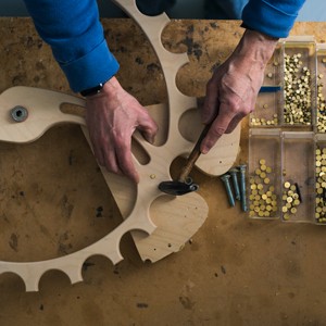 David C. Roy creating and assembling kinetic sculptures in his workshop