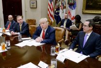 President Trump discusses the Federal budget in the Roosevelt Room of the White House. OMB director Mick Mulvaney sits to the President's right and Treasury Secretary Steven Mnuchin sits to his left.