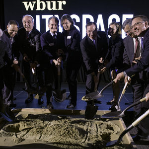 Lead funders for WBUR’s CitySpace dig their shovels into a pit of sand during the ground breaking ceremony and celebration of the upcoming, state-of-the-art multimedia venue.