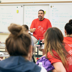 The big day: High school math teacher Jamil Siddiqui (ENG’93, Wheelock’94, GRS’98) gives his calculus students some last-minute encouragement before they take their AP exam. Photo by Kelly Davidson