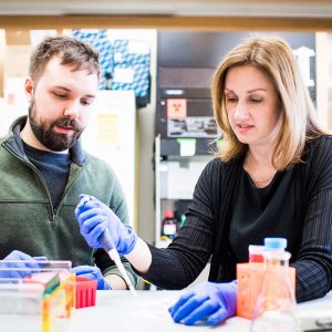 Catherine Klapperich, here with PhD candidate Justin Rosenbohm (ENG’20) in her lab. Photo by Jackie Ricciardi