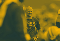 Sports dietitian Adam Korzun on the sidelines during a Green Bay Packers game.