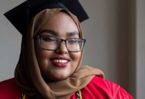 A portrait of Lul Mohamud wearing her cap and gown