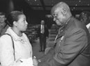 Former Zambian President Kenneth Kaunda greets former U.S. Senator Carol Moseley-Braun (D-Ill.), who in 1992 became the first African-American woman elected to the U.S. Senate, at a conference at BU organized by the University's African Presidential Archives and Research Center (APARC) on September 25. Kaunda is the first African former head of state to take part in APARC's Balfour President-in-Residence program. He'll be at BU for a year, lecturing and traveling around the United States to discuss Zambia's economy and government as well as the push toward democracy in other African nations. Kaunda was Zambia's first president, serving from 1964 until 1991, when he stepped aside after losing a multiparty democratic election. He kicked off his visit by delivering the keynote address at the APARC conference, which brought together scholars to discuss ways of integrating Africa into the global economy. Kaunda said African nations need Western investment and trade more than governmental assistance. "The aid African countries received did not contribute to economic and social development," he said. "For us to achieve economic prosperity, we need access to markets in developed countries and reasonable returns." Moseley-Braun led a panel discussion later in the day about how the September 11 World Trade Center attacks have affected the African economy. To learn more about APARC and the residency program, visit www.bu.edu/bridge/archive/2002/09-20/balfour.htm or www.bu.edu/aparc. Photo by Kalman Zabarsky