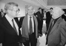 Chancellor John Silber talks with Elie Wiesel and Aharon Appelfeld (from left) at a reception at the School of Management after Appelfeld’s address. Photo by Fred Sway