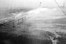 Heavy surf breaks over Quadrangular dock in Woods Hole, Mass., during the Hurricane of 1938. The biggest storm of the century killed 99 in the state and a total of more than 600 in New England. Photo courtesy of NOAA Photo Library