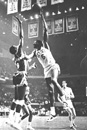 In a photo from Dynasty's End, Bill Russell, "the eagle with the beard," scores over the Knicks' Walter Bellamy in the Boston Garden. Photo courtesy of the Sports Museum of New England