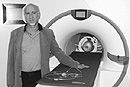 Eric Schwartz, a CAS professor in the department of cognitive and neural systems, is using this functional magnetic resonance scanner at the Massachusetts General Hospital’s research facility to peer into the visual cortex. The real-time images are shedding light on how the brain makes sense of the visual world. Photo by Bruce Caplan