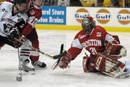 BU goaltender Sean Fields (CAS04) makes one of 35 saves, as Ryan Whitney (CAS05) holds off Northeasterns Brian Tudrick, in BUs 5-2 victory in the opening round of the Beanpot tournament February 2. The Terriers, facing Boston College in the final at the FleetCenter on February 9 at 8 p.m., will shoot for their 9th Beanpot trophy in 10 years. Photo by Rob Klein