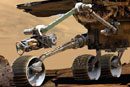 The robotic arm on both the Spirit and Opportunity Mars exploration rovers has instruments that can grind away rock layers, take microscopic images, and analyze the elemental composition of rock and soil. Illustration courtesy of NASA 