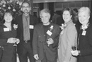 A long-running CFA chorus line: Andr de Quadros (second from left), a CFA professor and the director of the school of music, attended March 25's 2004 Service Recognition Dinner with longtime school of music faculty. Recognized at the dinner and awards ceremony were (from left) Penelope Bitzas, a CFA associate professor and 10-year honoree, de Quadros, Theodore Antoniou, a CFA professor and 25-year honoree, and 10-year honorees Shiela Kibbe-Hodgkins, a CFA assistant professor and chairman of the piano department, and Ann Howard Jones, a CFA professor and director of choral activities. Photo by Fred Sway 