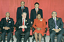 BU bestowed its Alumni Award upon eight alums at the Universitys annual Alumni Awards Breakfast on Saturday, October 16. Among those receiving the award are (standing, from left) Edward J. Zander (GSM75), a pioneer of dot-com marketing while at Sun Microsystems and presently chairman and CEO of Motorola, and Hugo Shong (COM87, GRS92), senior vice president of International Data Group and president of IDG Asia; (seated, from left) Leon E. Wilson (MET75), founder of First Community Bank and retired executive vice president and managing director of Fleets Charitable Asset Division, BU Trustee Richard DeWolfe (MET71,73), former chairman and CEO and now managing partner of the real estate management and investment firm DeWolfe and Company, Jackie Jenkins-Scott (SSW73), a community leader and Wheelock College president, and Sarkis J. Kechejian (MED63), who began his four-decade medical career at the School of Medicine and is now president and treasurer of Alliance Health. Not pictured is Morton H. Friedman (SMG43), a philanthropist and founder of the womens clothing chain Hit or Miss. Longtime CGS Dean Brendan Gilbane (DGE50, COM52, GRS59,69), who passed away in 2001, was honored with a posthumous award. Photo by Fred Sway