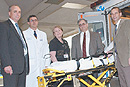Boston Medical Centers emergency department accepts a third of Bostons ambulances every day, but has managed to serve more patients faster. Over the past two years, John Chessare (from left), Jonathan Olshaker, Linda Fisher, nurse manager of the BMC emergency department, Eugene Litvak, and Niels Rathlev have been working to improve the departments efficiency. Photo by Kalman Zabarsky