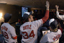 Red Sox supporters keep the faith in BU Central during game one of the World Series on October 23: (left to right) Brian Fudge (COM08), Jay Kramer (CAS08), Tilson Allen-Merry (COM08), and Nathan Penn (SMG08). Photo by Kalman Zabarsky