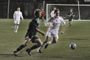Mens soccer midfielder John Cooper (SMG06) (right) and a Dartmouth player vie for control of the ball during BUs victory over the Big Green in the first round of the NCAA Tournament, at Nickerson Field on November 19. The teams battled to a 2-2 double-overtime tie, but the Terriers edged Dartmouth, 4-3, in penalty kicks. However, BUs outstanding postseason run came to an end November 23 with a 3-1 loss to St. Johns in Jamaica, N.Y. Photo by Albert LEtoile