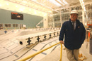 Warin Dexter, director of the Department of Physical Education, Recreation, and Dance, at the competition pool in the Fitness and Recreation Center. The pool will be one of two in the new building, which opens next spring. Photo by Vernon Doucette