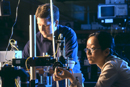 Matthew K. Emsley (ENG03) and Yan Li (ENG07) at work in the Optical Characterization and Nanophotonics Laboratories, directed by Bennett Goldberg, a CAS and GRS physics professor and department chairman, and Selim nl, an ENG electrical and computer engineering professor. Research teams overseen by Goldberg and nl have received major grants from the National Science Foundation, which in November had its budget slashed by $105 million. Photo by Vernon Doucette