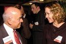 Aram Chobanian chats with Elizabeth Freidinger (COM03), of Oakland, Calif., at an alumni reception in San Francisco on January 15. Photo by Fred Sway