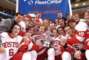 The hockey Terriers celebrate their 3-2 overtime victory over Northeastern in the Beanpot championship game at the FleetCenter February 14. Holding the trophy is captain Brian McConnell (MET05), who scored one of the games goals. Photo by Vernon Doucette