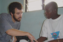 Kevin Fiori (SPH03) (left) and Rodrigue, a member of Association Espoir Demain, which provides HIV/AIDS services in Togo. Photo by Anna Summa