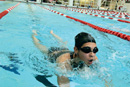Student swimming.