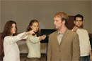 Emma Greer (CFA07) (from left), Katy Rubin-Weinstein (CFA07), Matt Peterson (CFA05), and Greg Hildreth (CFA05) each play several roles in The Laramie Project, the play that uses interviews and court transcripts to recount the 1998 murder of Matthew Shepard. Photo by Albert B. Ltoile
