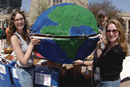 Earth-friendly. Andie Gersh (UNI07), Andrew Rahmberg (CAS07), and Victoria Barbato (SED07) (from left) display a papier-mch globe of the world as students celebrate Earth Day at a gathering at Marsh Plaza on April 22. The festivities, which included used clothing and recycling drives, were organized by the Office of Environmental Health and Safety, the Environmental Student Organization, and the Student Unions Sustainability Committee. This years celebration attracted an estimated 500 people, the largest turnout at a campus Earth Day event thus far. Photo by Kalman Zabarsky