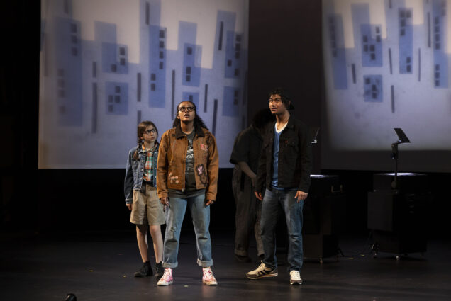 Eviva Rose (left) as Charles Wallace Murry, Beza Mekonnen as Meg Murry, and Miles Allen as Meg’s friend Calvin in a scene from Wheelock Family Theatre’s production of A Wrinkle In Time