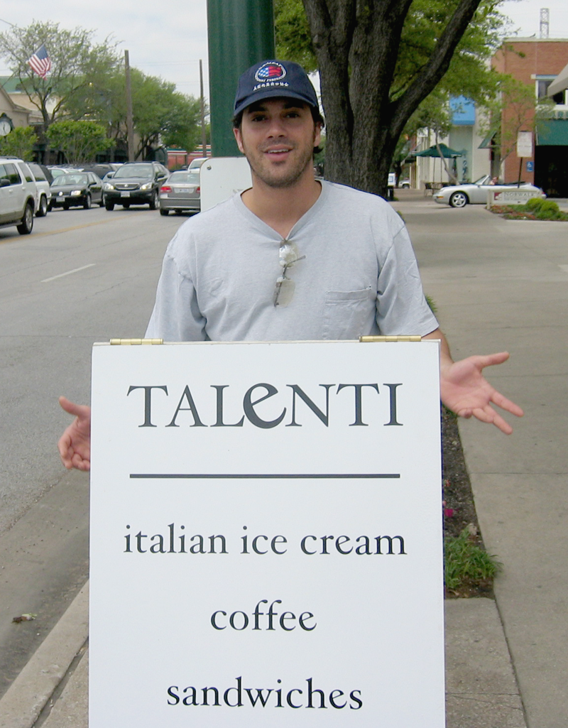 Josh Hochschuler holding promotional signage near the Talenti Gelato brick-and-mortar gelatería on Knox Street in Dallas, Tex., in 2003. It was open for two years.