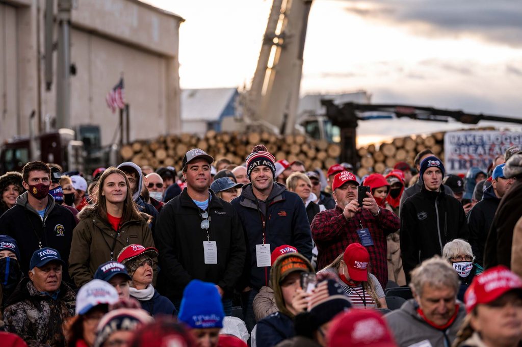 Fans attend a Trump rally in Minnesota, September 30, 2020, many wearing no face covering