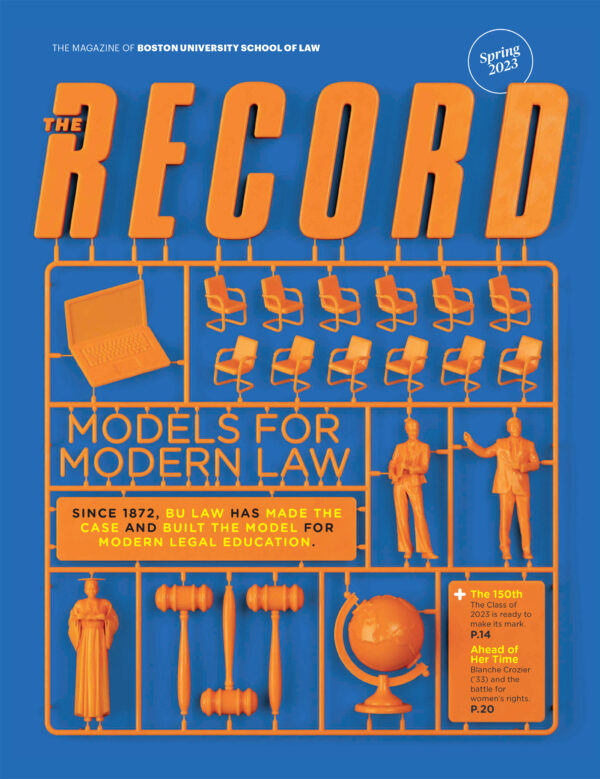 The Record, spring 2023 magazine cover: An orange snap model kit with gavels, jury seats, law graduates, and other items related to the practice of law sit against a blue background.