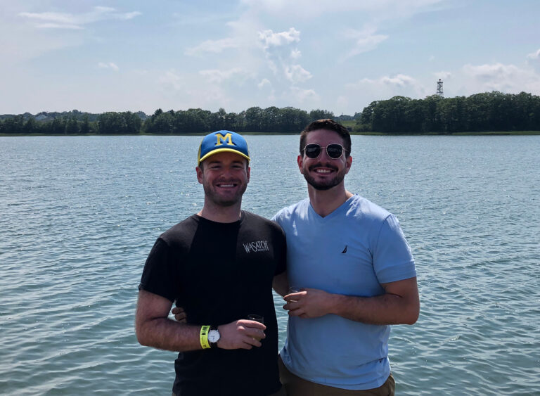 Jeremy Brunner ('24) with his brother with a lake in the background