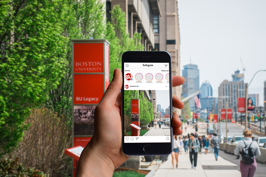 image of a hand holding an iphone on commonwealth avenue