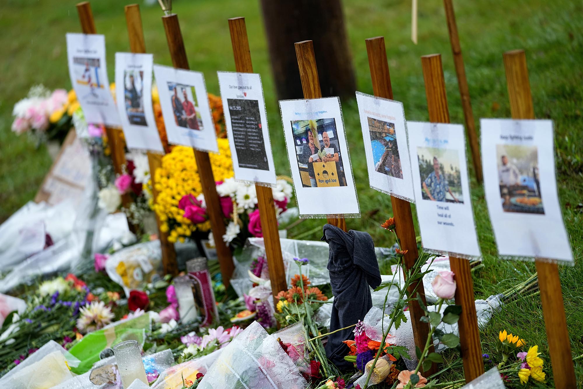Rain-soaked memorials for those who died in a mass shooting in Lewiston, Maine
