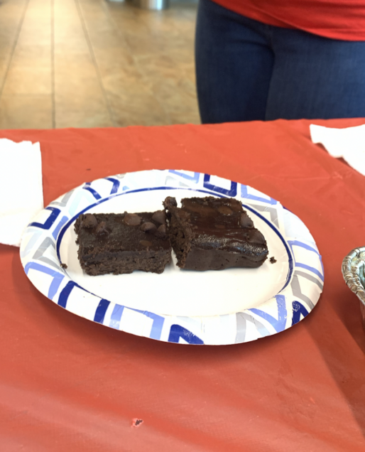 Picture of two fudgy brownies on a plate