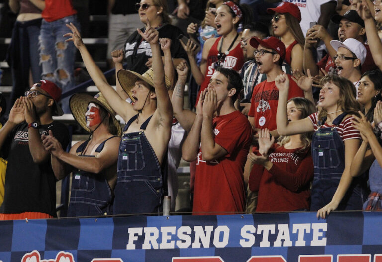 Students cheering at Fresno State University.