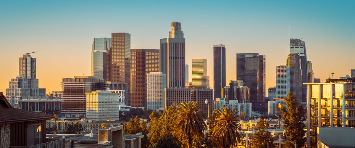 the skyline of los angeles during sunset
