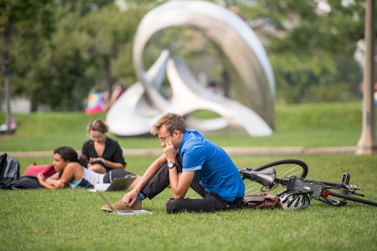 Students studying on BU Beach