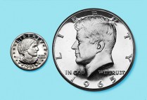 susan b. anthony dollar coin and john f. kennedy half-dollar coin