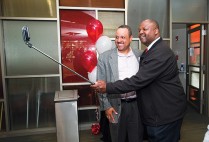 Albert James (ENG’85, Questrom’95) (left) and Terry Anthony (ENG’86) snap a selfie