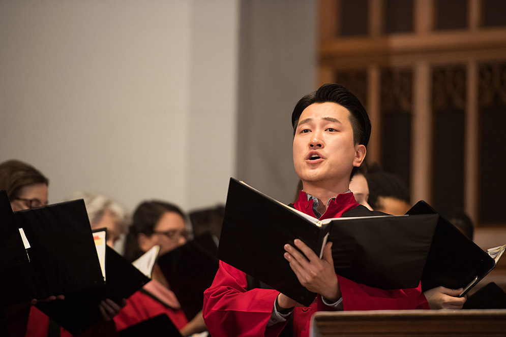 Marsh Chapel choir member Junhan Choi singing during the Baccalaureate Service at the 2017 BU Commencement