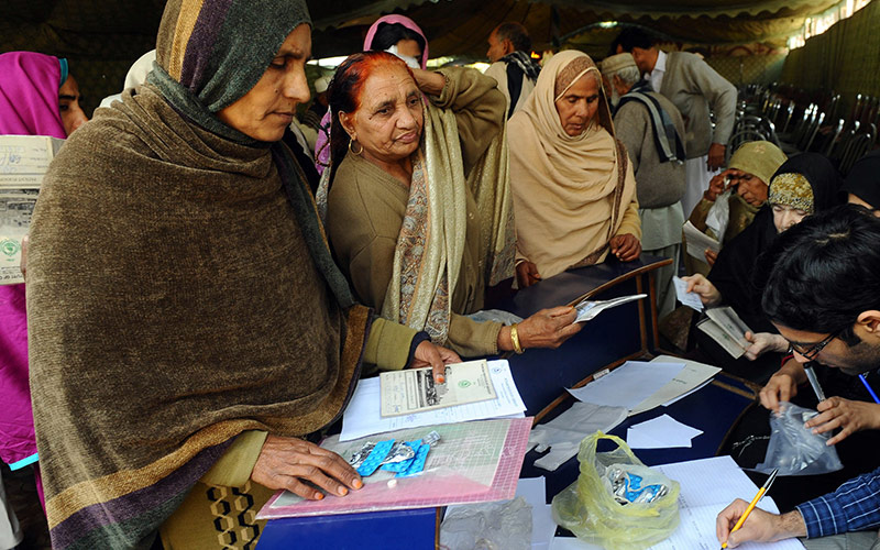 Heart patients return faulty medicine at a hospital in Lahore, Pakistan, where more than 200 people died in 2012 after a hypertensive drug was contaminated with an antimalarial, creating a deadly mixture.