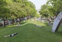 Students lying on BU Beach