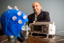Prof Rob Reinhart has a new paper coming out in PNAS.  In his research, he has been able can up-regulate or down-regulate cognitive performance via non-invasive brain stimulation in health humans. Pictured here with some equipment including a high definition cranial electrical current stimulator.Prof Rob Reinhart has a new paper coming out in PNAS.  In his research, he has been able can up-regulate or down-regulate cognitive performance via non-invasive brain stimulation in health humans. Pictured here with some equipment including a high definition cranial electrical current stimulator.