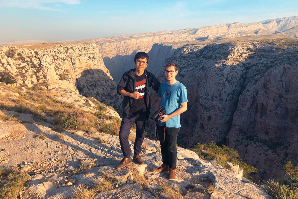 Zachary Flint (CGS’17, COM’19) (right) and his producer, Han, scaled the weathered plateaus of Inner Mongolia to make the documentary Blue Sheep. Photo courtesy of Flint