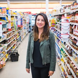 Researcher Didem Kurt poses for a photo in a grocery store