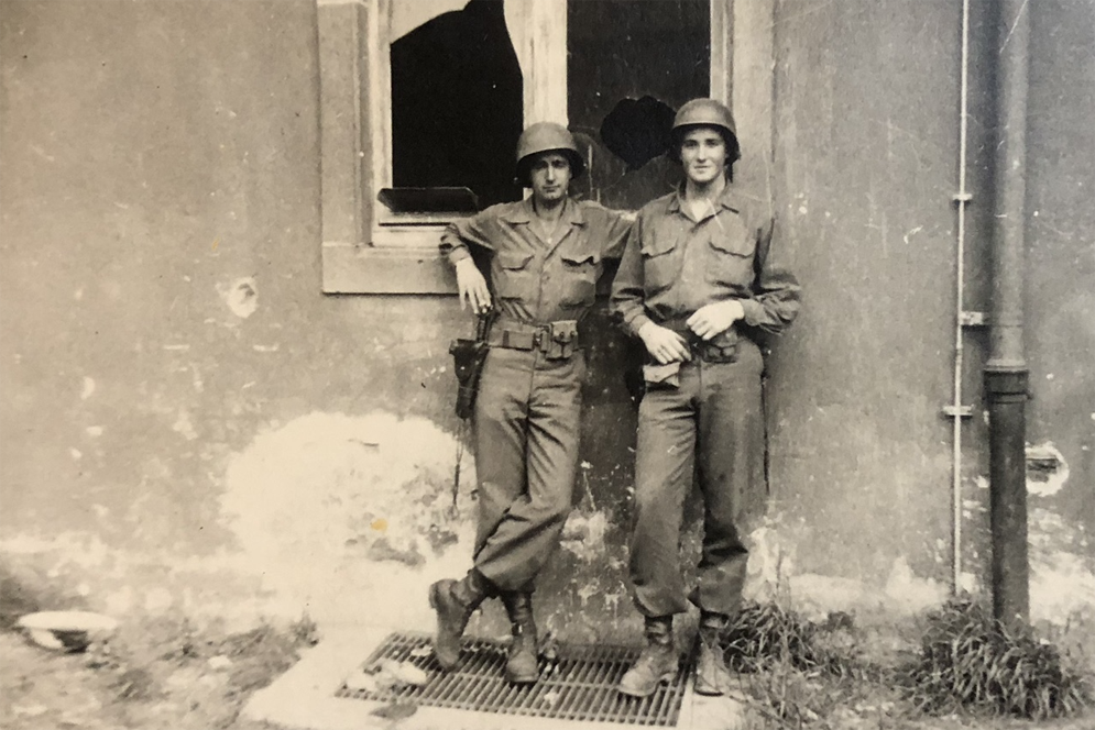John Waller, right, and an unidentified comrade in war-torn France, early 1945. 