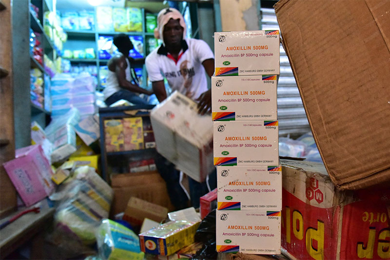 Around the world, one in ten medicines is substandard or counterfeit, which could be contributing to a rise in drug-resistant bacteria. Here, fake boxes of amoxicillin, a commonly used antibiotic, are seized from a store in Côte d'Ivoire. Photo by Issouf Sanogo/AFP/Getty Images