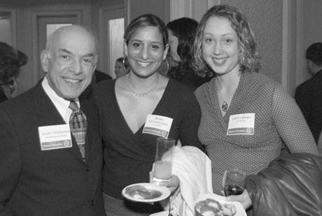 Coast-to-coast greeting. President ad interim Aram Chobanian traveled to California last week to host events for alumni and parents in Los Angeles and San Francisco. Accompanying him were Christopher Reaske, vice president for development and alumni relations, and trustee Judi Friedberg-Chessin (SED'59), president of the Boston University Alumni. Recent grads Reina Govindarajan (CAS'03) (center) and Elizabeth Freidinger (CAS'03) chat with Chobanian at a reception held at the Beverly Hills Hotel on January 15. Photo by Fred Sway